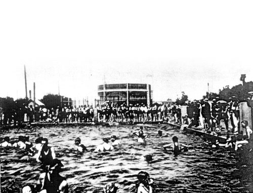 Bathers enjoying a swim at the Municipal Swimming Pool in Peisley Street, circa 1930.The pool was opened in 1924 on the site of the current Orange City Library and Regional Gallery